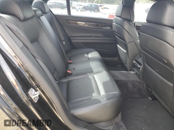 2011 BMW 7 Series with VIN WBAKX8C52BC198377, listed as a Copart auction lot 70003444 with 173,725 mi miles and Salvage title. Bid and sale history available at DreamBid. Image 10.