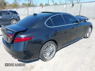 2017 Alfa Romeo Giulia Ti with VIN ZARFAEEN9H7551464, listed as a IAAI auction lot 41726121 with 68,654 mi miles. Bid and sale history available at carsss.com. Image 4.