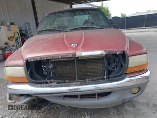 2000 Dodge Dakota with VIN 1B7GL22X2YS587779, listed as a IAAI auction lot 42231475 with 179,200 mi miles and . Bid and sale history available at carsss.com. Image 6.