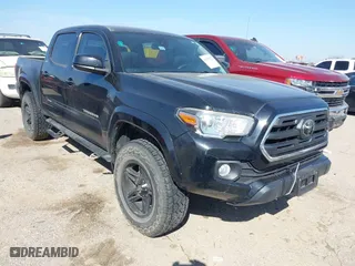 2019 Toyota Tacoma 4WD SR with VIN 5TFCZ5ANXKX166417, listed as a IAAI auction lot 41679237 with 67,055 mi miles. Bid and sale history available at carsss.com. Image 1.