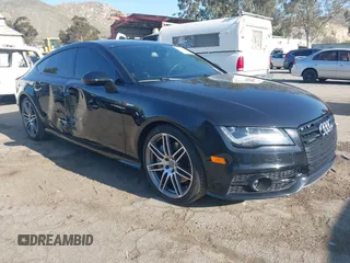2014 Audi A7 Prestige with VIN WAU2GAFC2EN081411, listed as a IAAI auction lot 41993803 with 66,008 mi miles and . Bid and sale history available at DreamBid. Image 1.