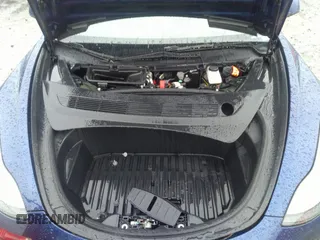 2023 Tesla Model 3 z VIN 5YJ3E1EA4PF576045, wystawiony jako IAAI lot #41565981 z przebiegiem Nie podano mil oraz . Historia ofert i sprzedaży dostępna na DreamBid. Obrazek 13.