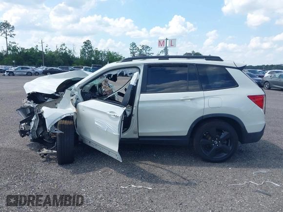 2019 Honda Passport Touring z VIN 5FNYF7H91KB001286, wystawiony jako IAAI lot #41733668 z przebiegiem Nie podano mil oraz . Historia ofert i sprzedaży dostępna na DreamBid. Obrazek 14.