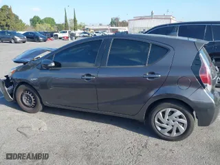 2015 Toyota Prius c One with VIN JTDKDTB33F1585004, listed as a IAAI auction lot 41950129 with 209,233 mi miles. Bid and sale history available at carsss.com. Image 14.