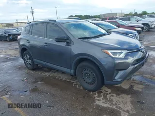 2016 Toyota RAV4 LE with VIN JTMZFREV5GJ097330, listed as a IAAI auction lot 41884397 with 107,699 mi miles. Bid and sale history available at carsss.com. Image 1.