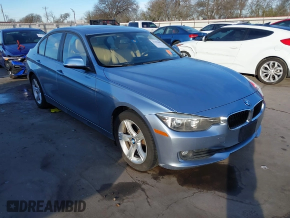 2013 BMW 3 Series 320i with VIN WBA3B1C56DK128089, listed as a IAAI auction lot 41332091 with 101,155 mi miles. Bid and sale history available at carsss.com. Image 1.