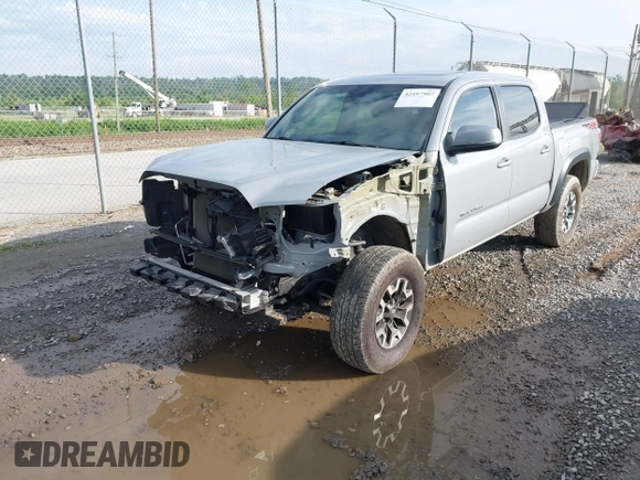 2021 Toyota Tacoma SR with VIN 5TFCZ5AN7MX255512, listed as a IAAI auction lot 42497907 with 50,563 mi miles and . Bid and sale history available at DreamBid. Image 18.