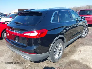 2016 Lincoln MKX Select with VIN 2LMTJ6KR9GBL59252, listed as a IAAI auction lot 41608092 with 144,128 mi miles. Bid and sale history available at carsss.com. Image 4.
