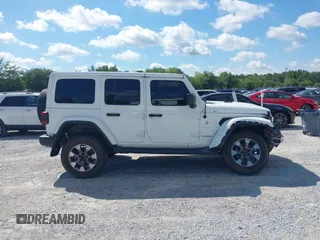 2019 Jeep Wrangler Unlimited Sahara with VIN 1C4HJXEG4KW514206, listed as a IAAI auction lot 42247094 with 45,712 mi miles and . Bid and sale history available at DreamBid. Image 13.