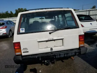 1996 Jeep Cherokee Sport with VIN 1J4FT68S0TL120534, listed as a Copart auction lot 74806974 with 284,147 mi miles and Non Repairable. Bid and sale history available at carsss.com. Image 6.