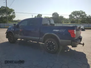2017 Nissan Titan Pro-4X with VIN 1N6AA1E5XHN544948, listed as a Copart auction lot 61851175 with 216,797 mi miles and Clean title. Bid and sale history available at DreamBid. Image 2.