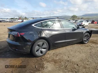 2019 Tesla Model 3 Mid Range with VIN 5YJ3E1EA3KF399335, listed as a Copart auction lot 49005185 with 38,270 mi miles and Salvage Title. Bid and sale history available at carsss.com. Image 3.