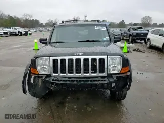 2010 Jeep Commander Sport with VIN 1J4RG4GK0AC128959, listed as a Copart auction lot 43027505 with 144,994 mi miles and Salvage Title. Bid and sale history available at carsss.com. Image 11.