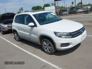 2013 Volkswagen Tiguan SE z VIN WVGAV7AX0DW502371, wystawiony jako IAAI lot #42046393 z przebiegiem 145 173 mil mil oraz . Historia ofert i sprzedaży dostępna na DreamBid. Obrazek 1.