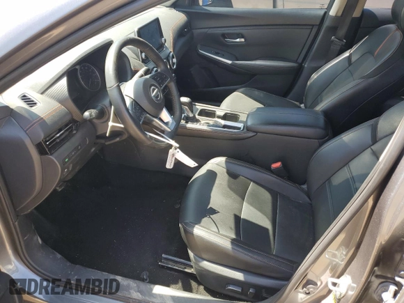 2023 Nissan Sentra SR with VIN 3N1AB8DV8PY271569, listed as a Copart auction lot 52112895 with 30,470 mi miles and Salvage Title. Bid and sale history available at DreamBid. Image 7.