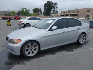 2007 BMW 3 Series 328i with VIN WBAVC53597FZ70807, listed as a IAAI auction lot 42078844 with 187,958 mi miles and . Bid and sale history available at carsss.com. Image 2.