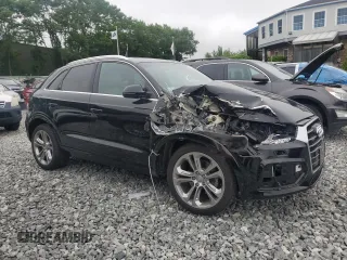 2017 Audi Q3 Prestige with VIN WA1GCCFS7HR001163, listed as a Copart auction lot 58800655 with 52,034 mi miles and Salvage title. Bid and sale history available at DreamBid. Image 4.