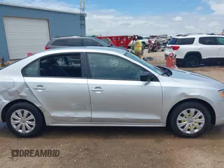 2013 Volkswagen Jetta S with VIN 3VW2K7AJ4DM410383, listed as a IAAI auction lot 42627193 with 154,300 mi miles and . Bid and sale history available at DreamBid. Image 13.