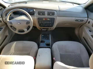 2003 Ford Taurus SE Standard with VIN 1FAFP53U13G188188, listed as a Copart auction lot 73574624 with 95,017 mi miles and Salvage Title. Bid and sale history available at DreamBid. Image 8.