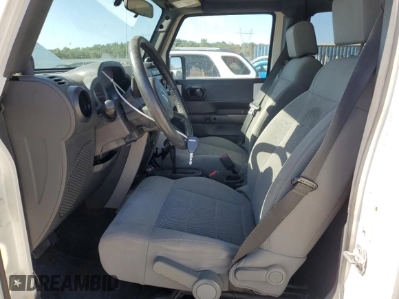 2009 Jeep Wrangler Unlimited Rubicon with VIN 1J8GA69149L767218, listed as a Copart auction lot 59342825 with 157,307 mi miles and Salvage title. Bid and sale history available at DreamBid. Image 7.