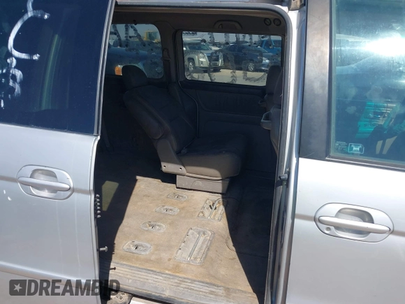 2004 Honda Odyssey EX-L with VIN 5FNRL18904B080009, listed as a IAAI auction lot 41736651 with 461,326 mi miles and . Bid and sale history available at DreamBid. Image 8.