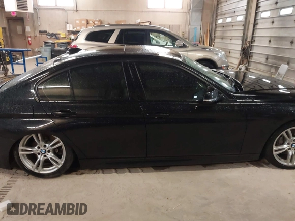 2015 BMW 3 Series 328i xDrive z VIN WBA3B3G56FNT19714, wystawiony jako IAAI lot #41831494 z przebiegiem 107 318 mil mil oraz . Historia ofert i sprzedaży dostępna na DreamBid. Obrazek 13.