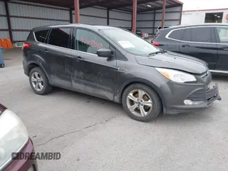 2015 Ford Escape SE with VIN 1FMCU0G71FUC54978, listed as a IAAI auction lot 41493558 with 254,455 mi miles. Bid and sale history available at carsss.com. Image 1.