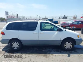 1998 Toyota Sienna LE with VIN 4T3ZF13C2WU066460, listed as a IAAI auction lot 42088006 with 169,014 mi miles and . Bid and sale history available at DreamBid. Image 13.