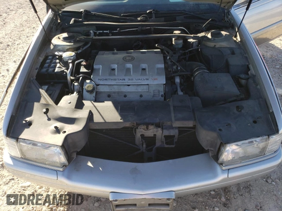 2000 Cadillac Eldorado Touring with VIN 1G6ET1295YU145248, listed as a Copart auction lot 82160574 with 87,294 mi miles and Salvage Title. Bid and sale history available at DreamBid. Image 12.