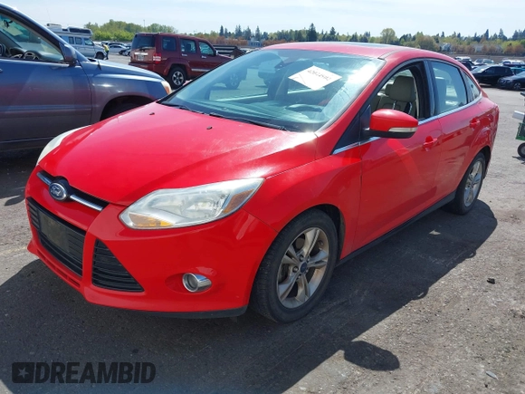 2012 Ford Focus SEL with VIN 1FAHP3H23CL291253, listed as a IAAI auction lot 42044902 with 184,716 mi miles. Bid and sale history available at carsss.com. Image 2.