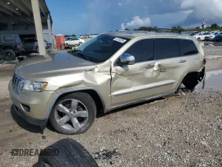 2011 Jeep Grand Cherokee Overland with VIN 1J4RS6GG4BC710103, listed as a Copart auction lot 51316235 with 179,393 mi miles and Salvage Title. Bid and sale history available at DreamBid. Image 1.