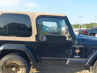2000 Jeep Wrangler Sahara with VIN 1J4FA59SXYP718029, listed as a IAAI auction lot 42583372 with 260,811 mi miles and . Bid and sale history available at DreamBid. Image 13.