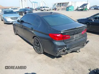 2018 BMW 5 Series M550i xDrive with VIN WBAJB9C55JB286747, listed as a IAAI auction lot 42583106 with 141,102 mi miles and . Bid and sale history available at DreamBid. Image 3.