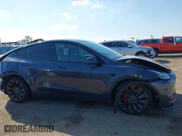 2023 Tesla Model Y Performance with VIN 7SAYGDEF5PF823122, listed as a IAAI auction lot 41546480 with 12,943 mi miles and . Bid and sale history available at DreamBid. Image 12.