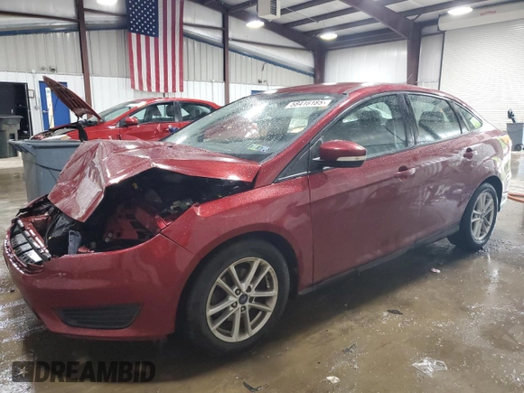 2017 Ford Focus SE with VIN 1FADP3F26HL209475, listed as a Copart auction lot 58416185 with 71,318 mi miles and Salvage title. Bid and sale history available at DreamBid. Image 1.