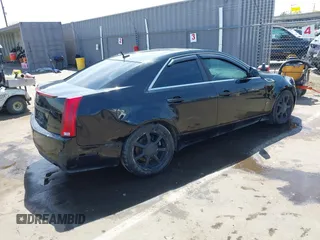 2008 Cadillac CTS RWD with VIN 1G6DV57VX80188428, listed as a IAAI auction lot 42033872 with 132,080 mi miles and . Bid and sale history available at DreamBid. Image 4.