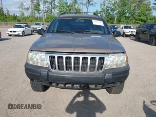 2001 Jeep Grand Cherokee Laredo with VIN 1J4GX48S91C559693, listed as a IAAI auction lot 42152103 with 152,713 mi miles and . Bid and sale history available at DreamBid. Image 6.