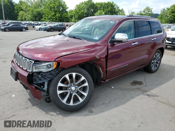 2017 Jeep Grand Cherokee Overland with VIN 1C4RJFCG5HC874130, listed as a Copart auction lot 65324695 with 101,588 mi miles and Salvage title. Bid and sale history available at DreamBid. Image 1.