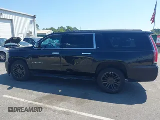 2015 Chevrolet Suburban LT with VIN 1GNSKJKC5FR275357, listed as a IAAI auction lot 42229934 with 359,009 mi miles and . Bid and sale history available at DreamBid. Image 14.