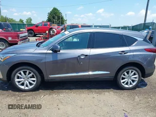 2020 Acura RDX with VIN 5J8TC2H35LL007934, listed as a IAAI auction lot 42597543 with 26,879 mi miles and . Bid and sale history available at DreamBid. Image 14.