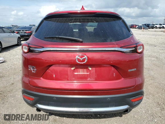 2021 Mazda CX-9 Grand Touring with VIN JM3TCBDY4M0539332, listed as a Copart auction lot 54756125 with 65,614 mi miles and Salvage title. Bid and sale history available at DreamBid. Image 6.