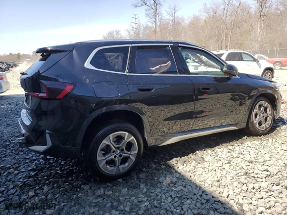 2025 BMW X1 xDrive28i with VIN WBX73EF00S5111795, listed as a Copart auction lot 48765255 with 12,042 mi miles and Salvage Title. Bid and sale history available at carsss.com. Image 3.