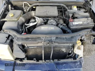2006 Jeep Commander Limited with VIN 1J8HH58N36C144683, listed as a Copart auction lot 74019594 with 144,543 mi miles and Salvage Title. Bid and sale history available at carsss.com. Image 12.