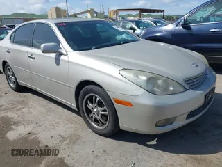 2004 Lexus ES 330 with VIN JTHBA30GX45038962, listed as a IAAI auction lot 41928613 with 301,057 mi miles. Bid and sale history available at carsss.com. Image 1.