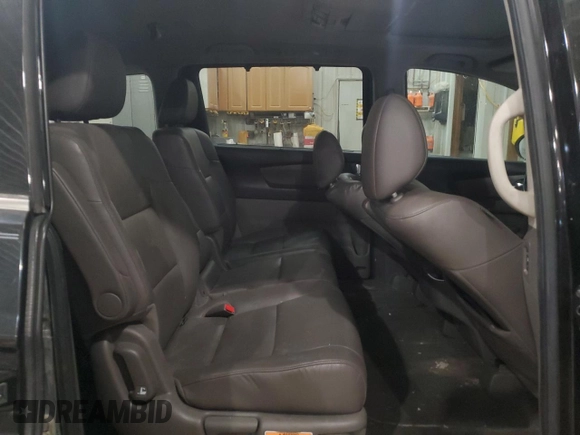 2014 Honda Odyssey Touring z VIN 5FNRL5H91EB128917, wystawiony jako Copart lot #49353085 z przebiegiem 208 871 mil mil oraz Czysty tytuł • Clean title. Historia ofert i sprzedaży dostępna na DreamBid. Obrazek 11.