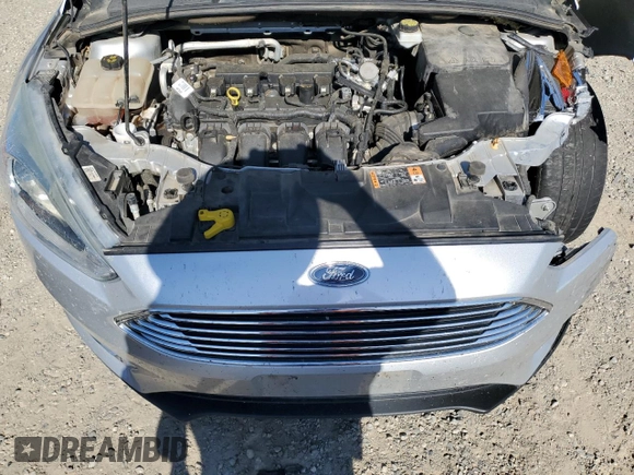 2017 Ford Focus Titanium with VIN 1FADP3N21HL279810, listed as a Copart auction lot 57950195 with 121,139 mi miles and Salvage title. Bid and sale history available at DreamBid. Image 11.