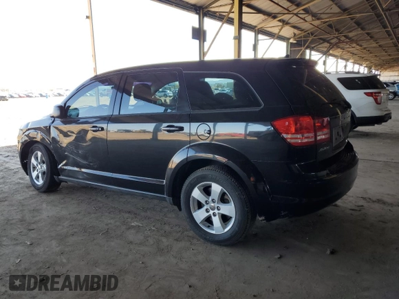 2013 Dodge Journey SE with VIN 3C4PDCAB4DT575943, listed as a Copart auction lot 48760385 with 127,081 mi miles and Salvage Title. Bid and sale history available at carsss.com. Image 2.