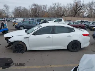 2017 Kia Optima LX with VIN 5XXGT4L32HG171992, listed as a IAAI auction lot 41477494 with 119,415 mi miles. Bid and sale history available at carsss.com. Image 13.