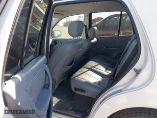 2001 Mercedes-Benz M-Class with VIN 4JGAB54E01A257846, listed as a IAAI auction lot 42010998 with 194,597 mi miles. Bid and sale history available at carsss.com. Image 8.