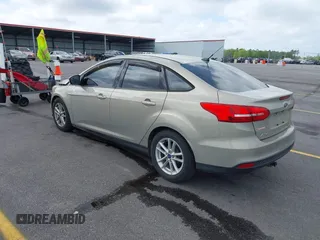 2016 Ford Focus SE with VIN 1FADP3F23GL350387, listed as a IAAI auction lot 41948782 with 70,188 mi miles. Bid and sale history available at carsss.com. Image 3.